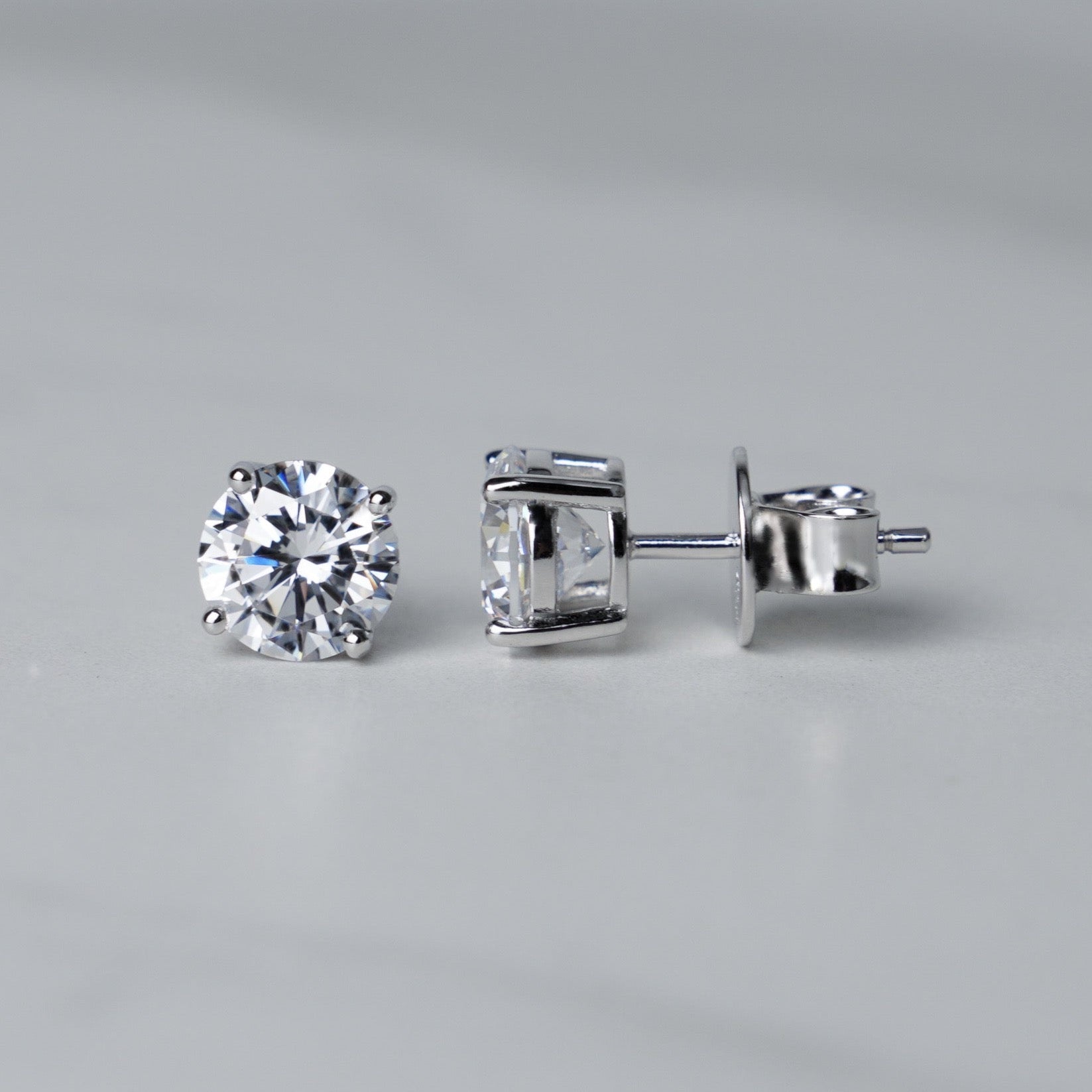 Round Solitaire Stud Earrings - Moissanites