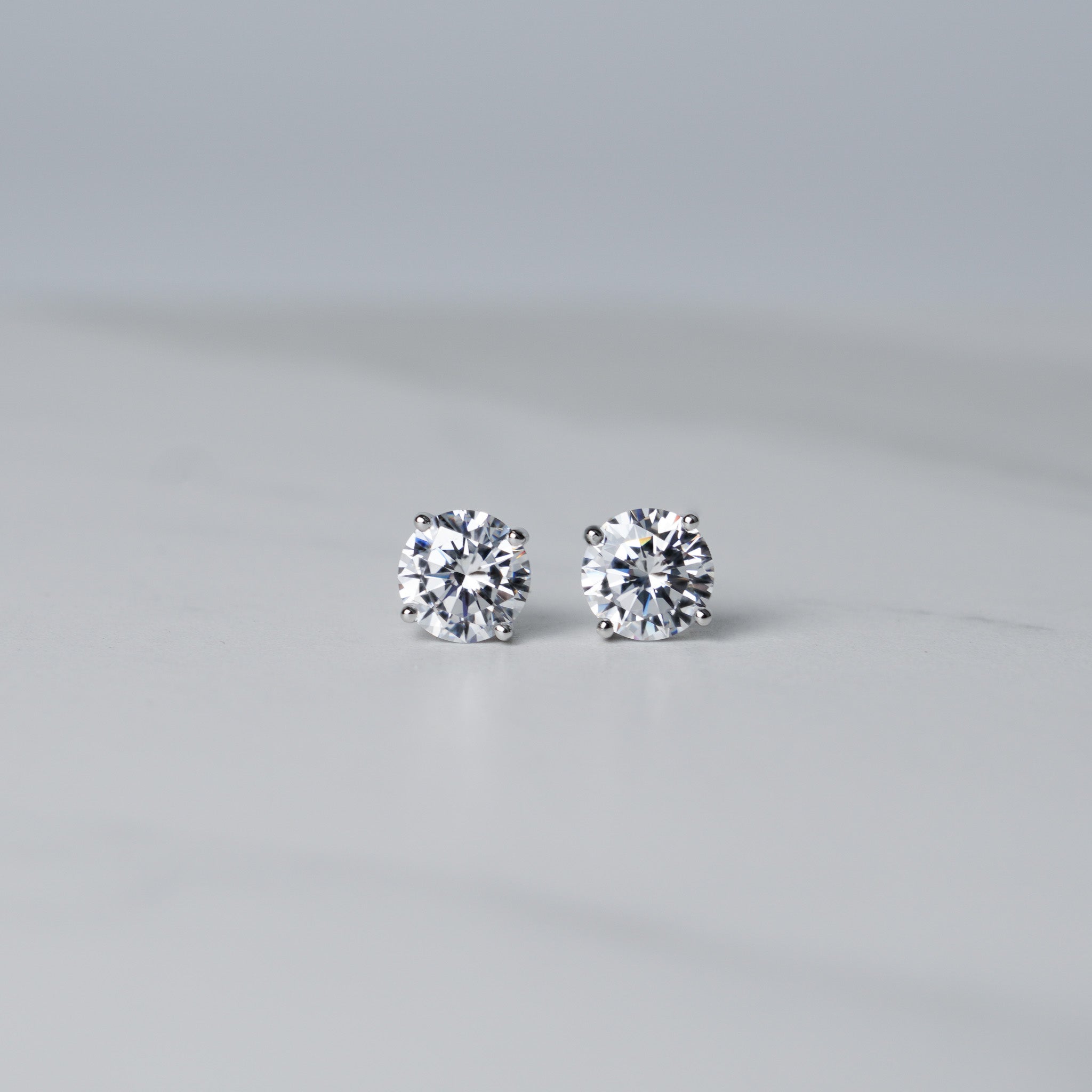 Small Round Solitaire Stud Earrings - Moissanites