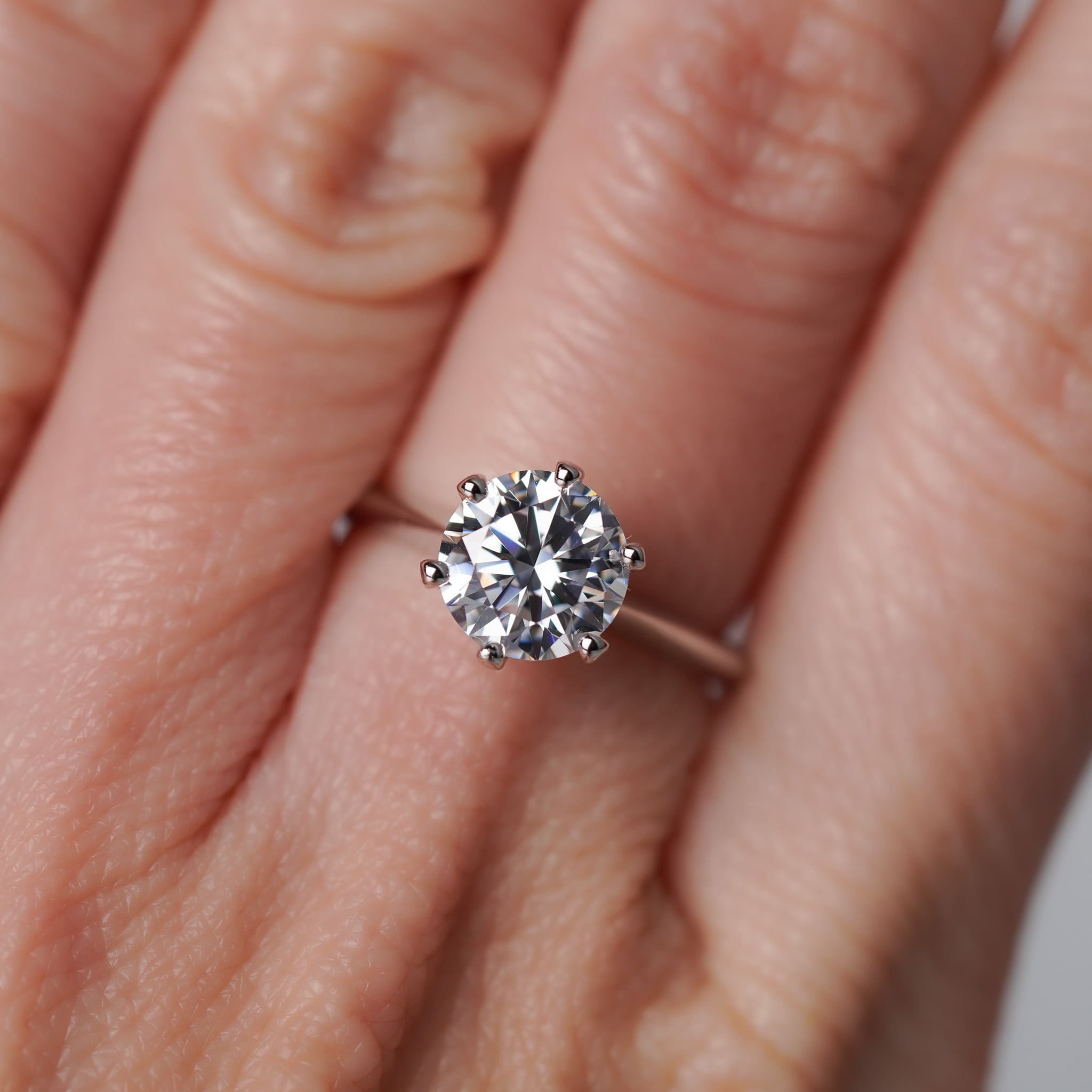 Round Solitaire Engagement Ring - Moissanite