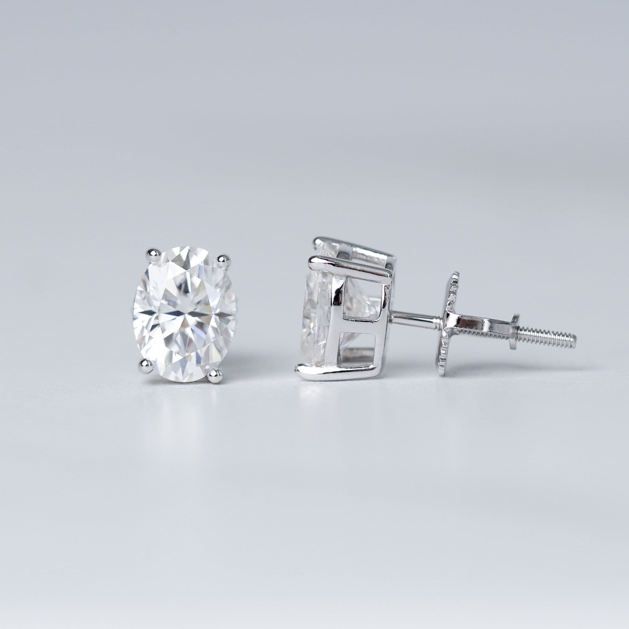 Oval Cut Solitaire Stud Earrings - Screwed Back - Moissanite