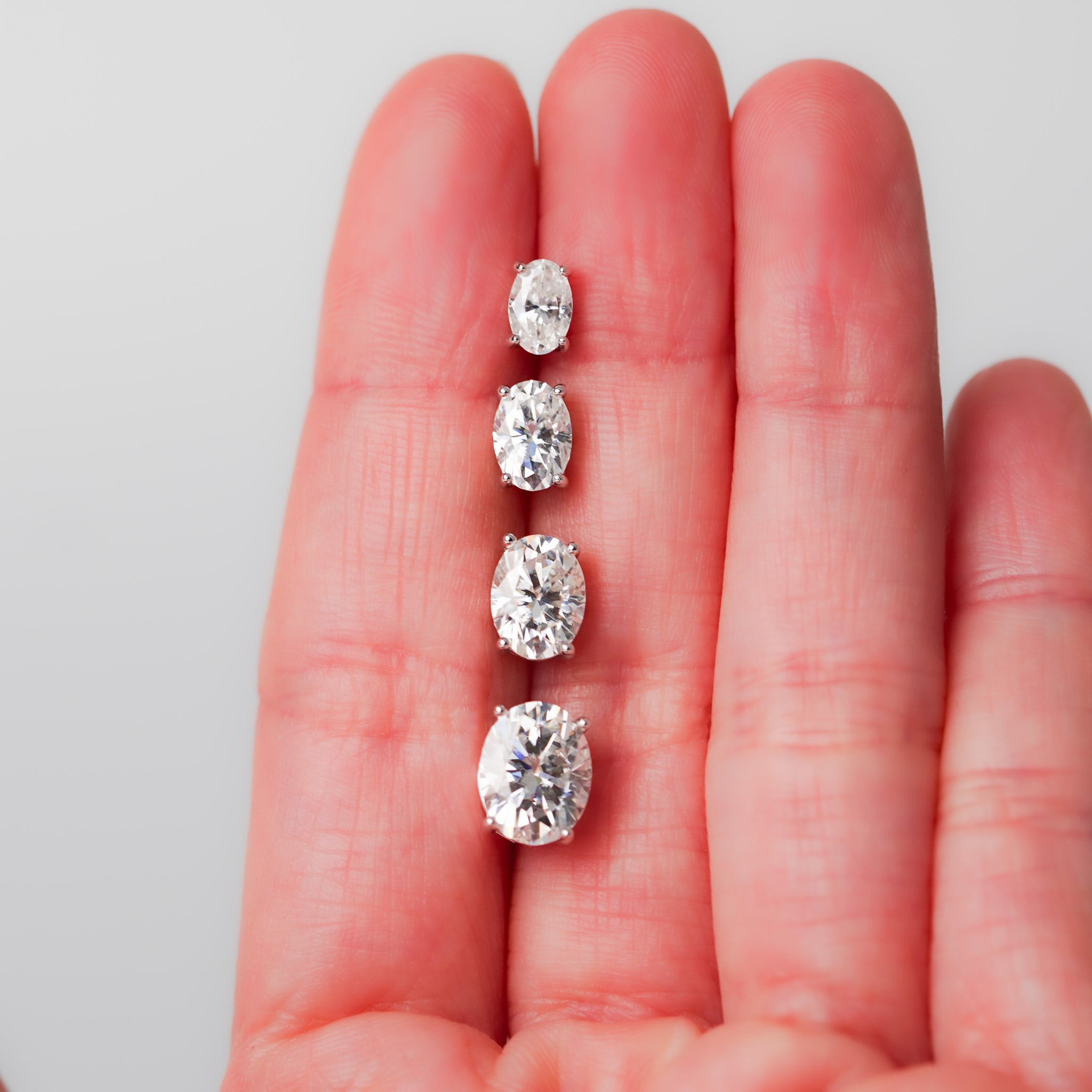 Oval Cut Solitaire Stud Earrings - Screwed Back - Moissanite