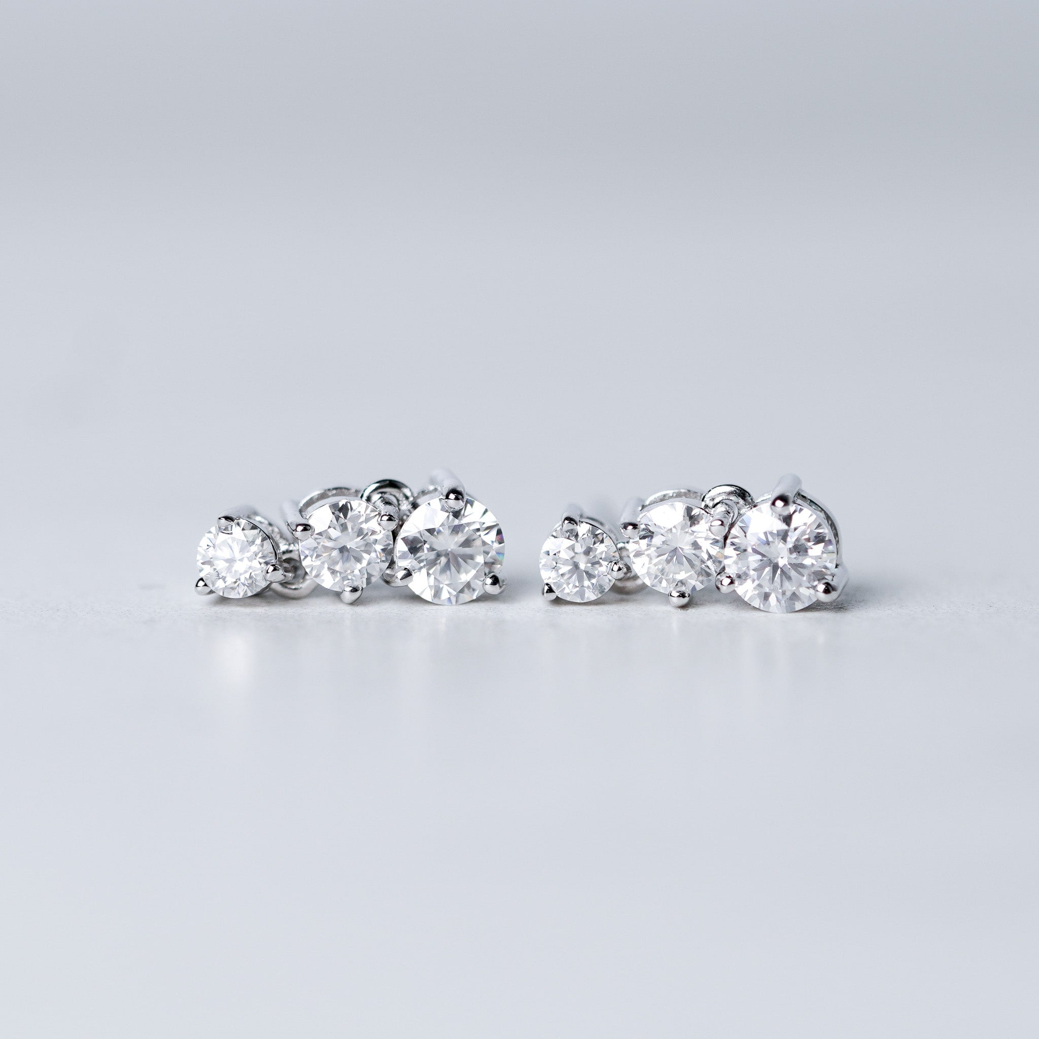 Three-Stone Drop Dangling Earrings in Sterling Silver – Moissanite