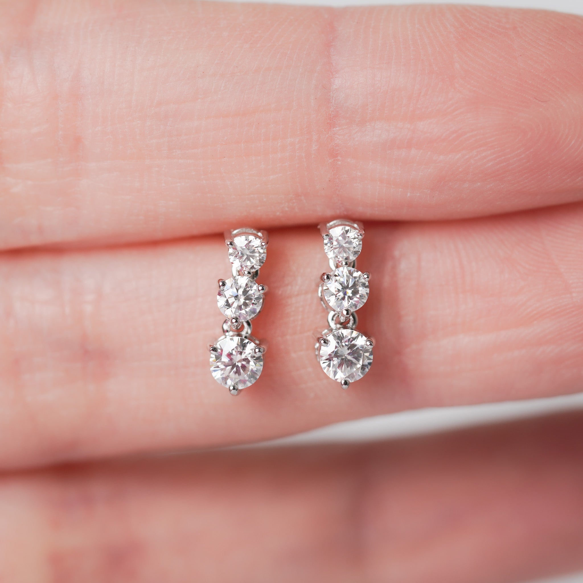 Three-Stone Drop Dangling Earrings in Sterling Silver – Moissanite