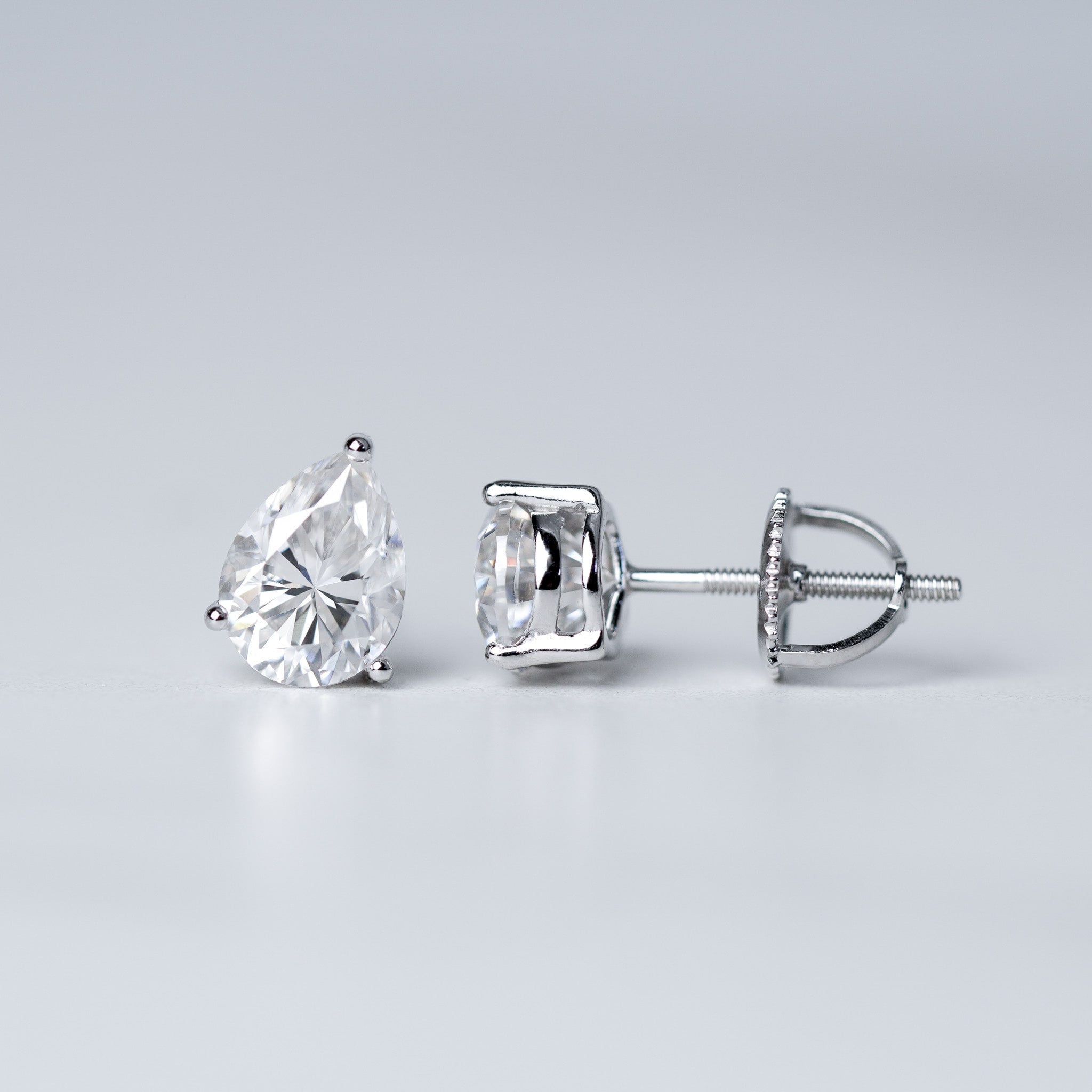Moissanite Pear Cut Solitaire Stud Earrings - Screwed Back