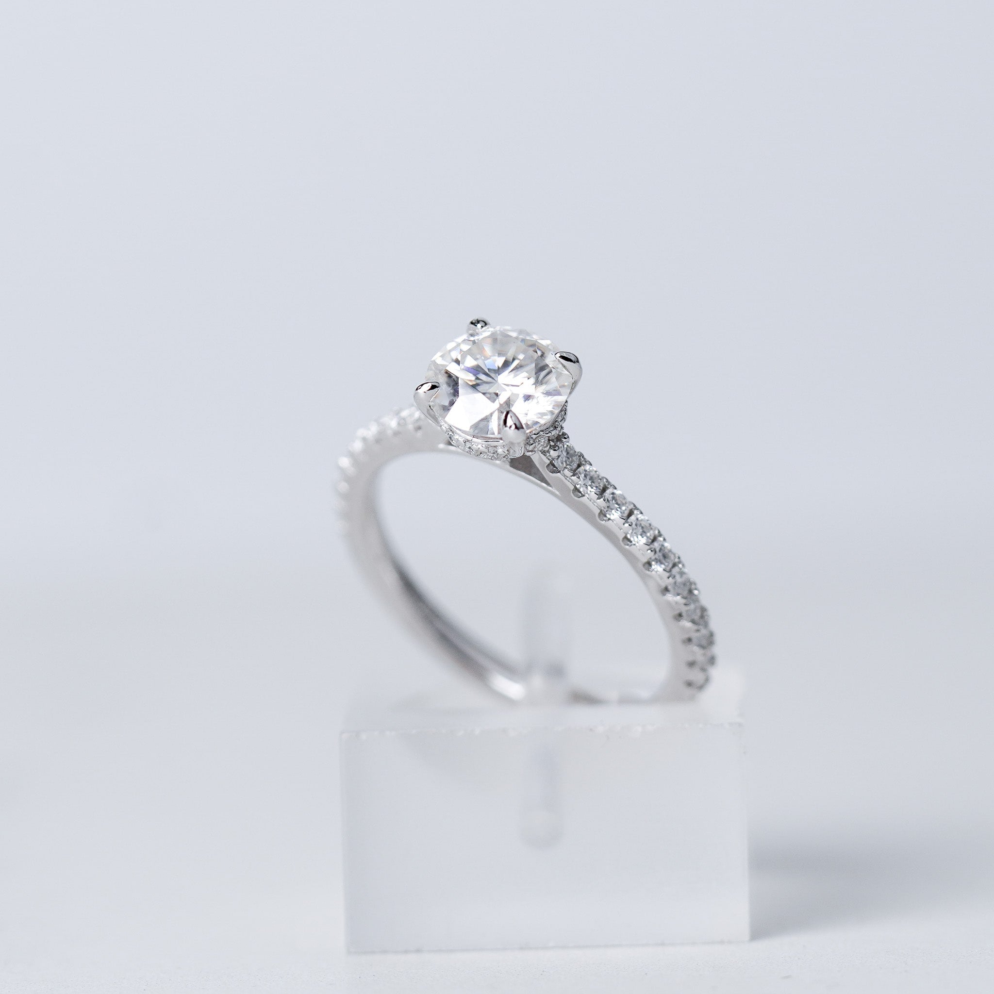 Moissanite Solitaire Engagement Ring - With Pave Side Stone