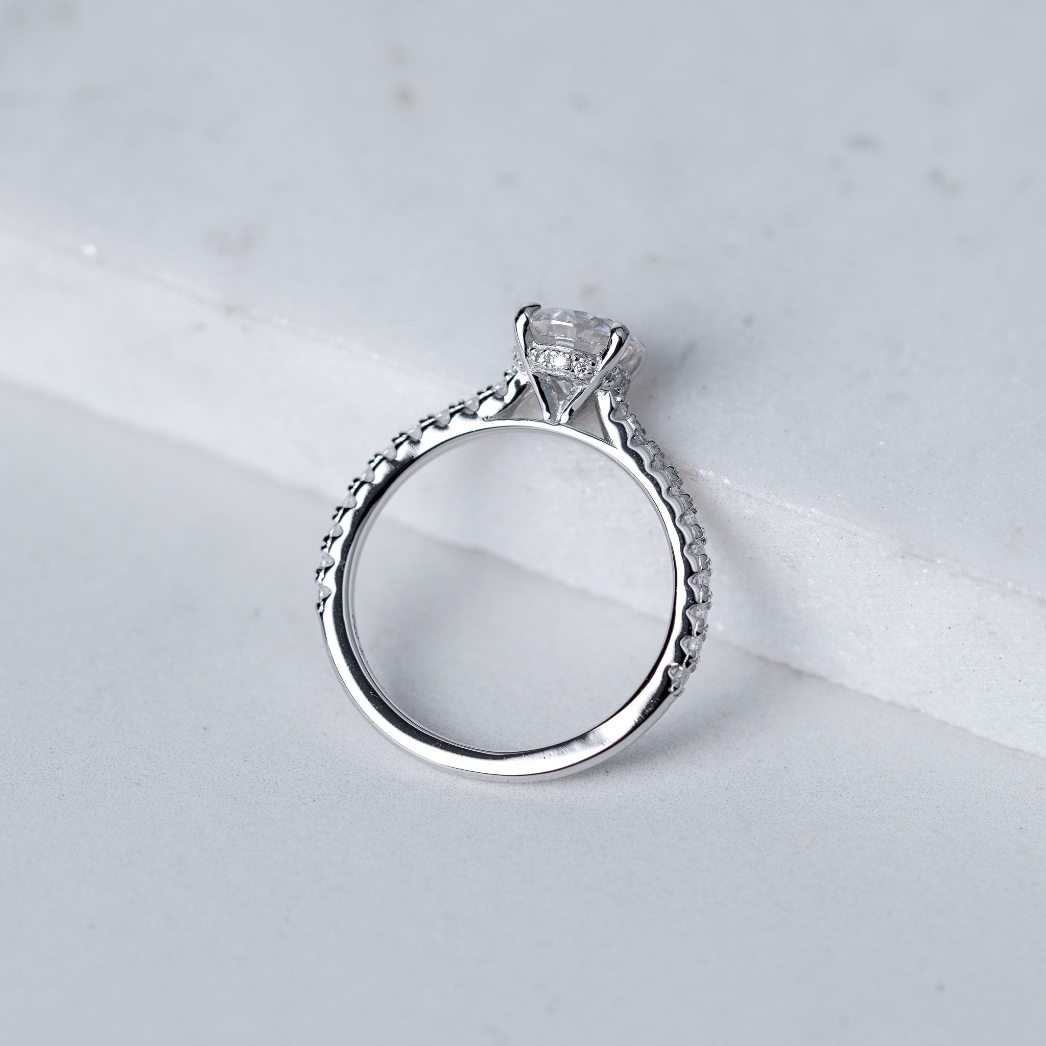 Moissanite Solitaire Engagement Ring - With Pave Side Stone