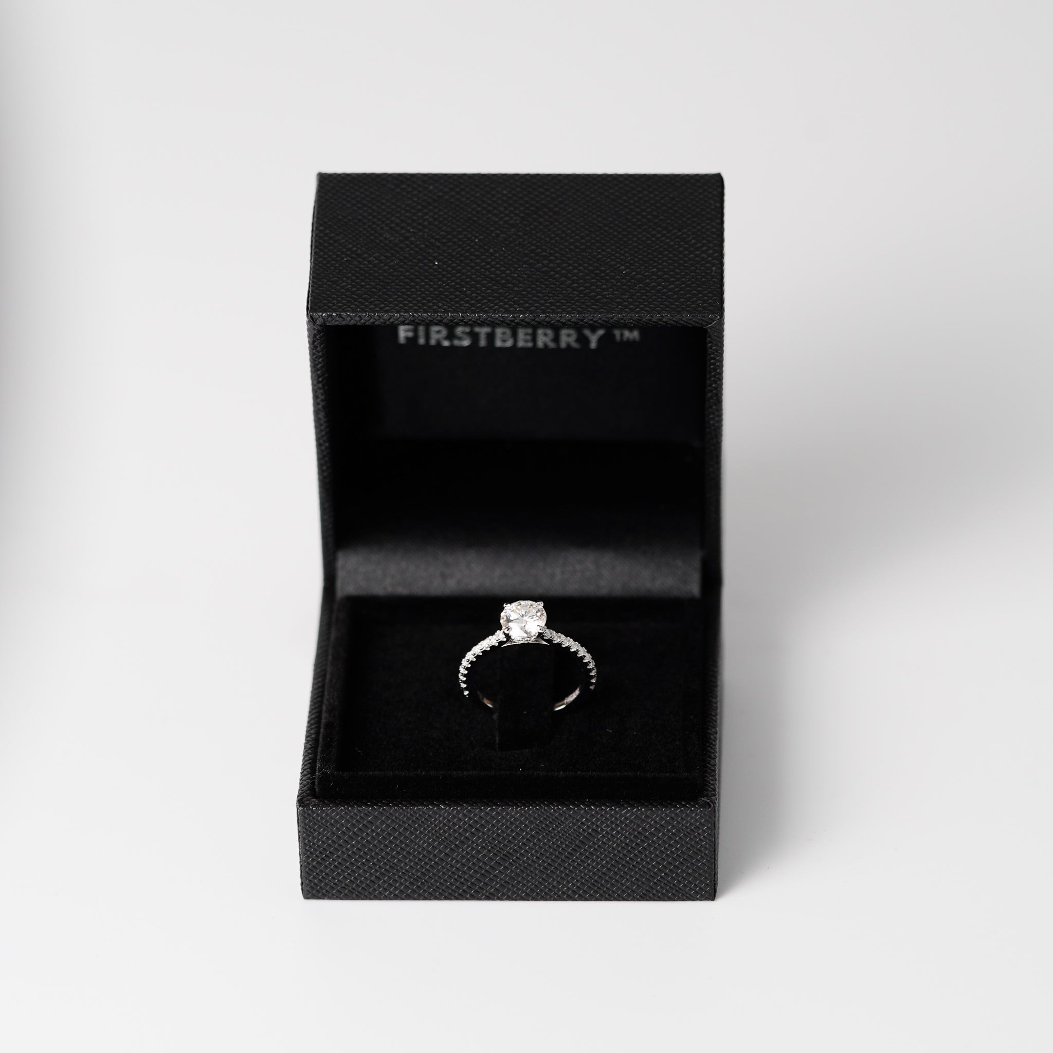 Moissanite Solitaire Engagement Ring - With Pave Side Stone