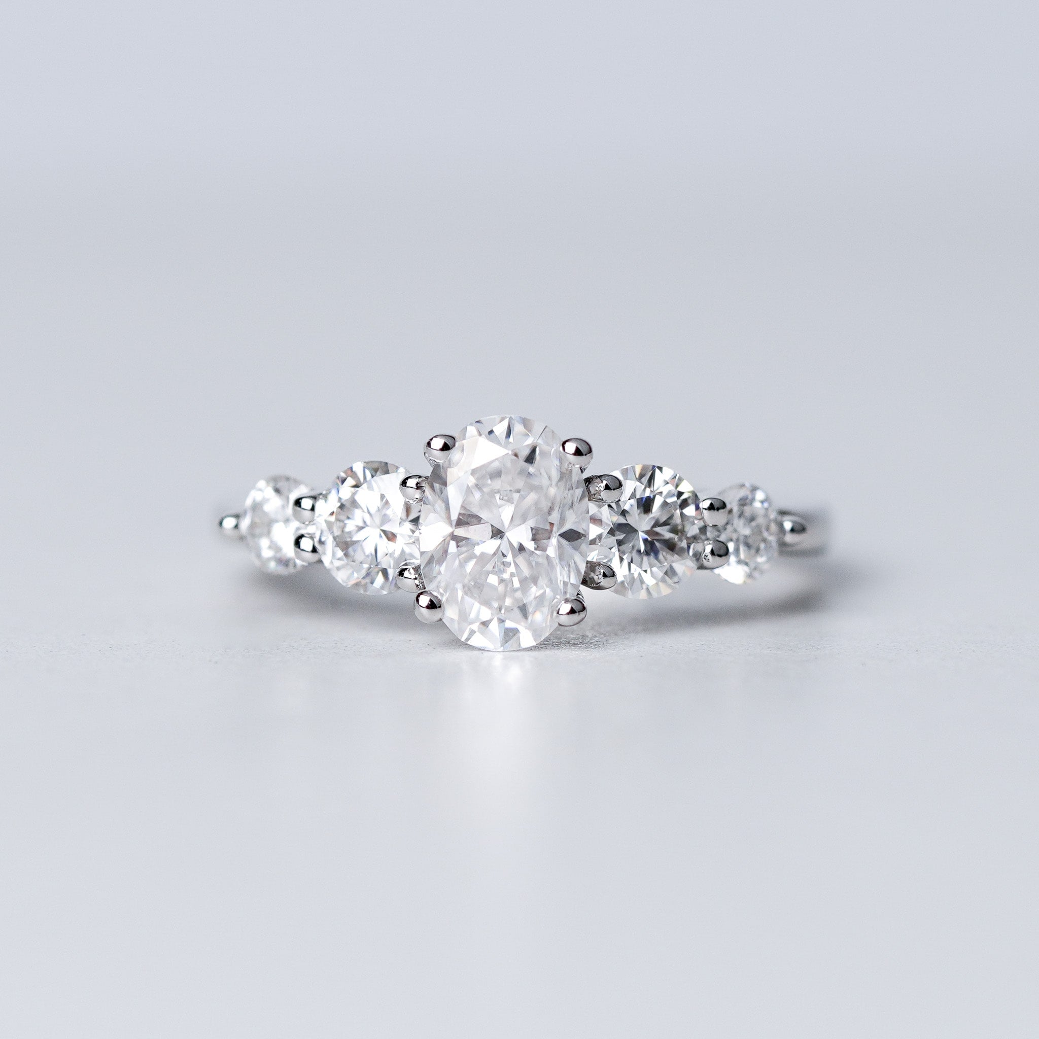 Oval Moissanite Ring - With Round Side Stones