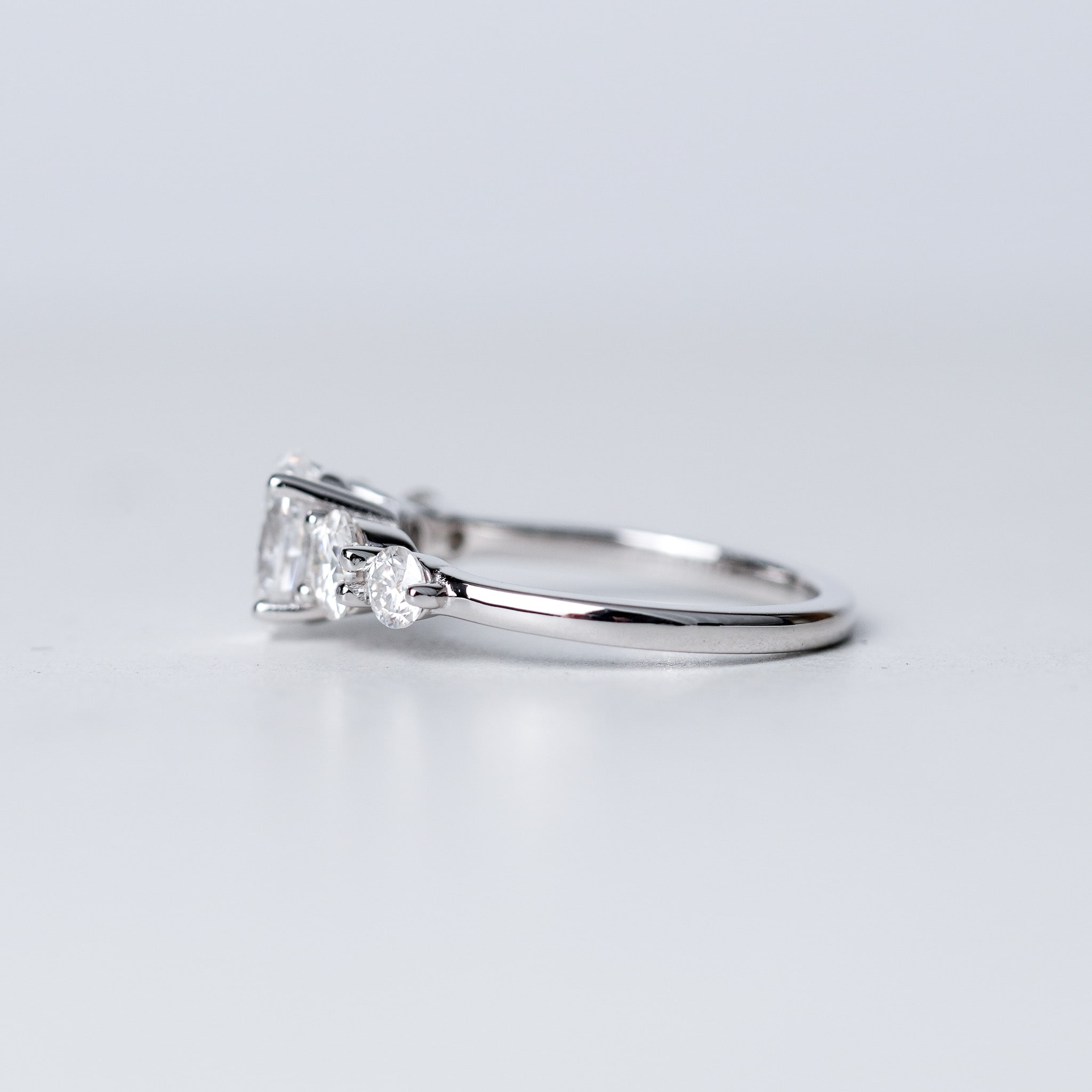 Oval Moissanite Ring - With Round Side Stones