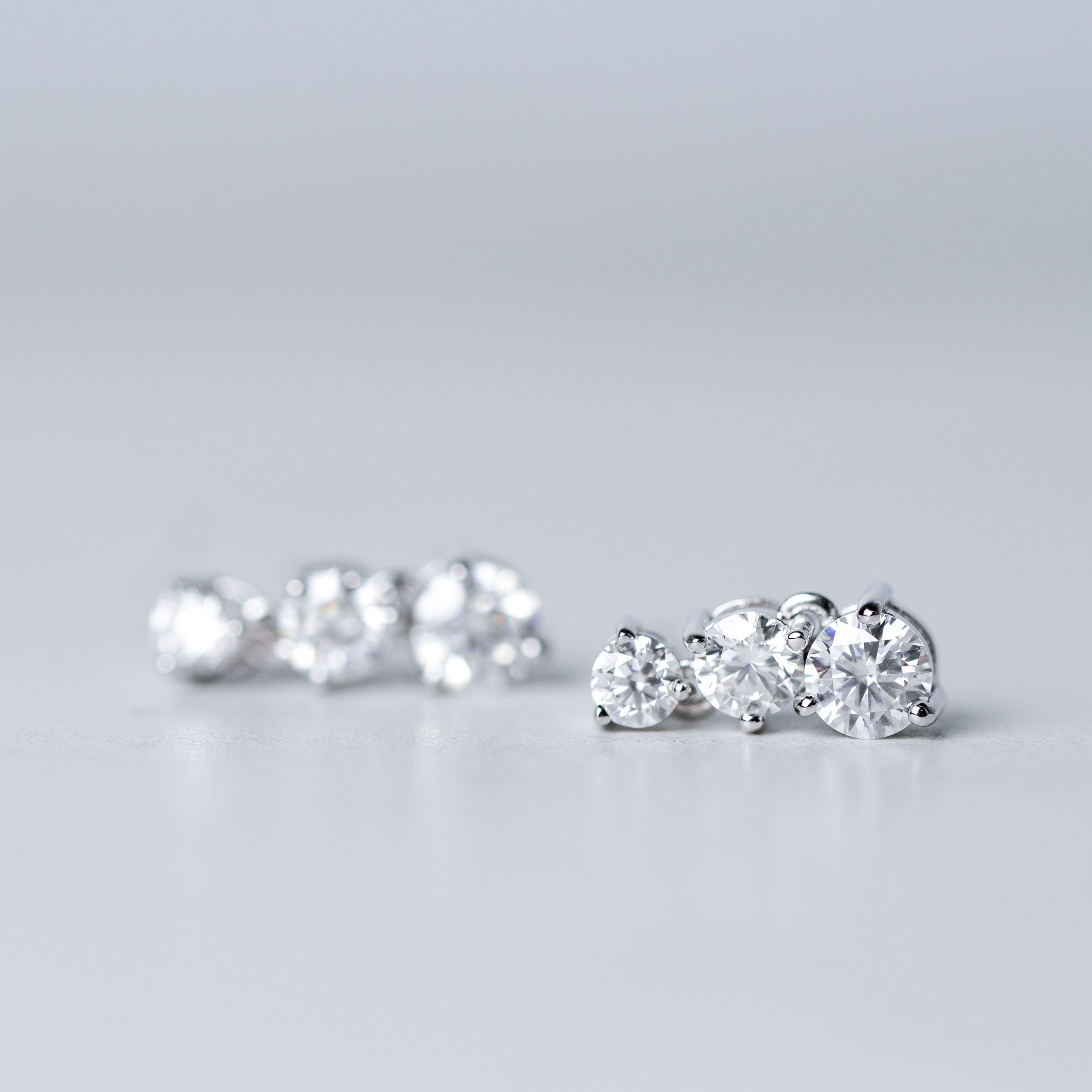 Three-Stone Drop Dangling Earrings in Sterling Silver – Moissanite