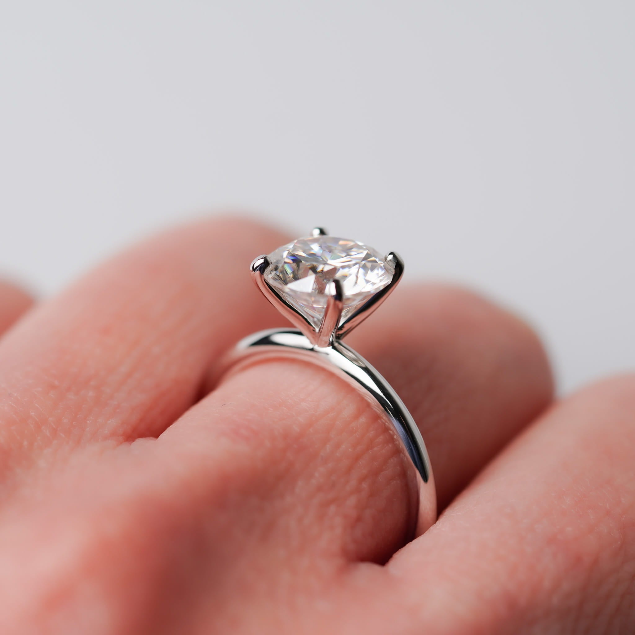 Four Prongs - Round Solitaire Engagement Ring - Moissanite